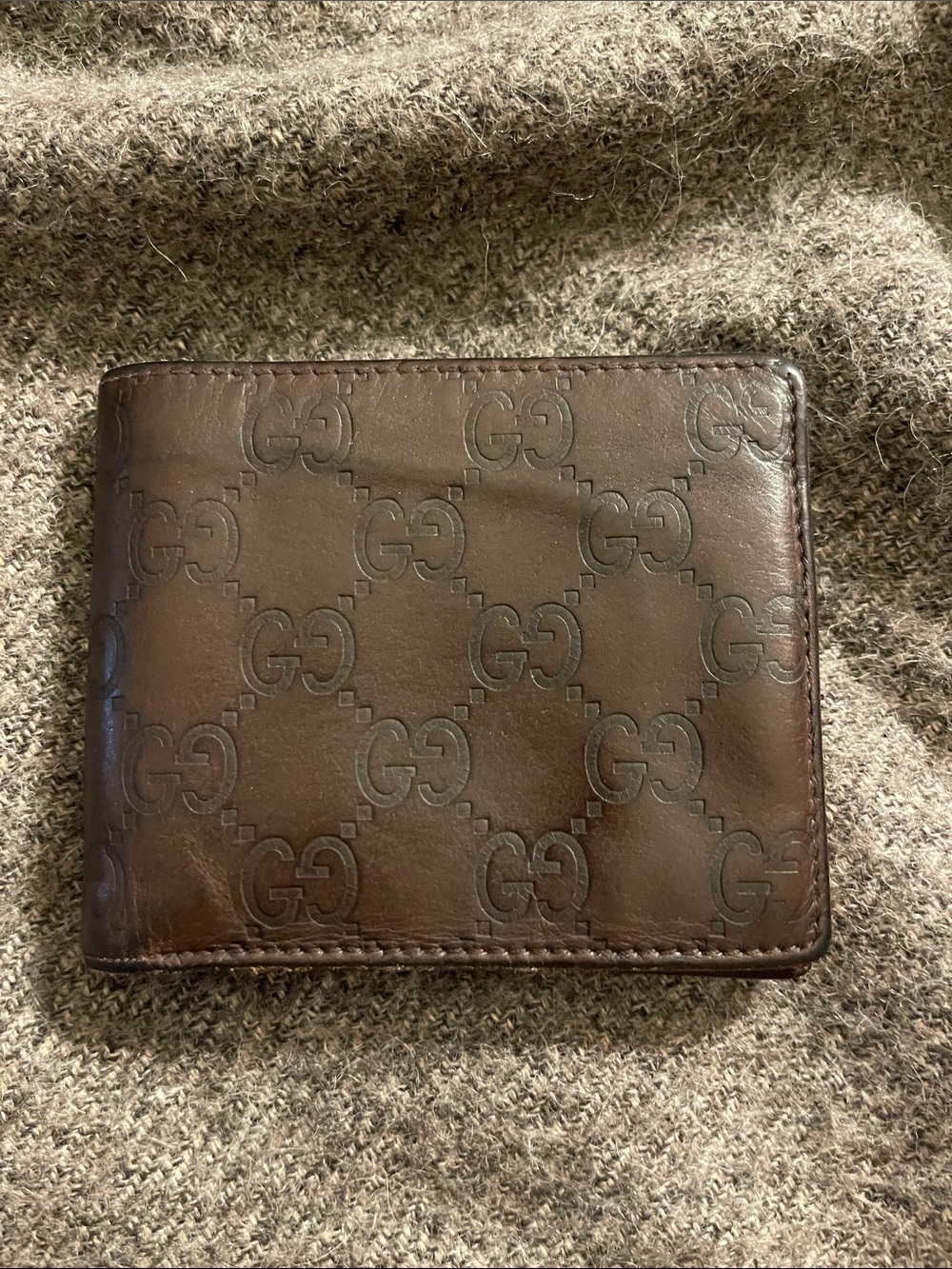 Gucci Brown GG Embossed Leather Wallet